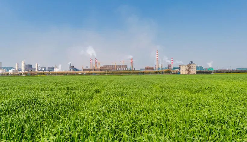 Industrial zone - surrounded by green gras and blue sky