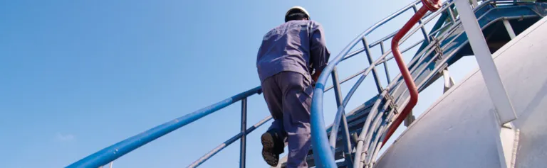 Surveyor on his way up the stairs