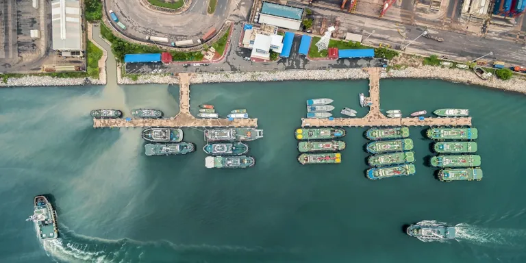 TVAS small port of tug boat in shipping yard at sea